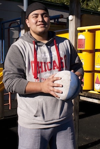 Iosis - Tawhiri holding rugby ball